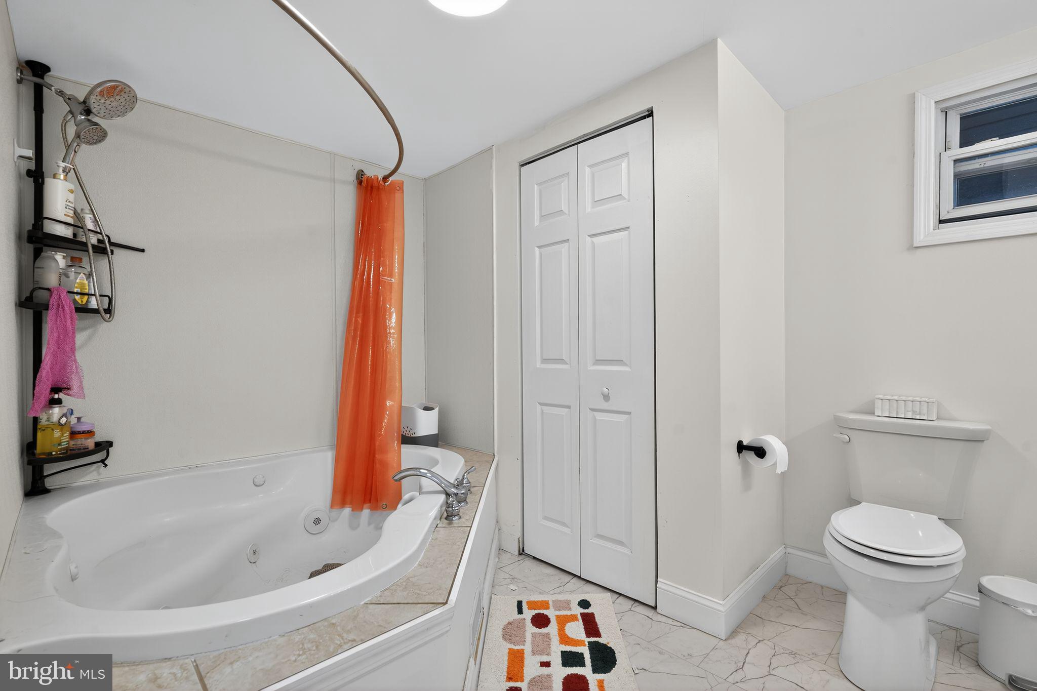 333 Jackson Road Mantua, NJ 08051 - Photo 33 of 34 a bathroom with a sink a toilet and shower
