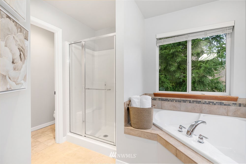 17813 20th Avenue Southeast, Unit 57 Bothell, WA 98012 - Photo 17 of 25 a view of bathroom with bathtub and shower