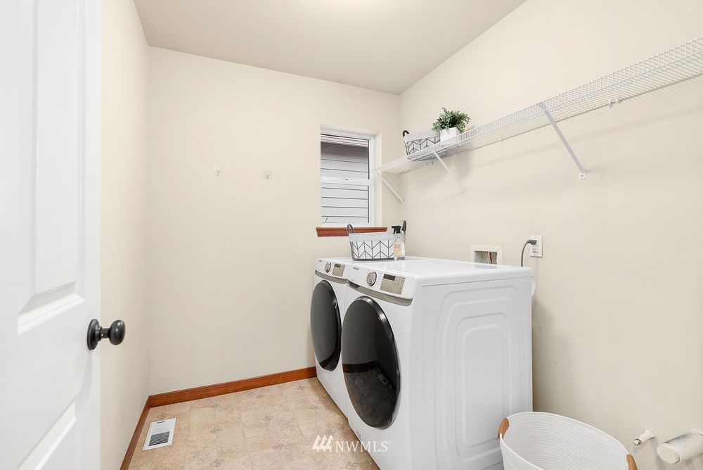 17813 20th Avenue Southeast, Unit 57 Bothell, WA 98012 - Photo 23 of 25 a utility room with dryer and washer