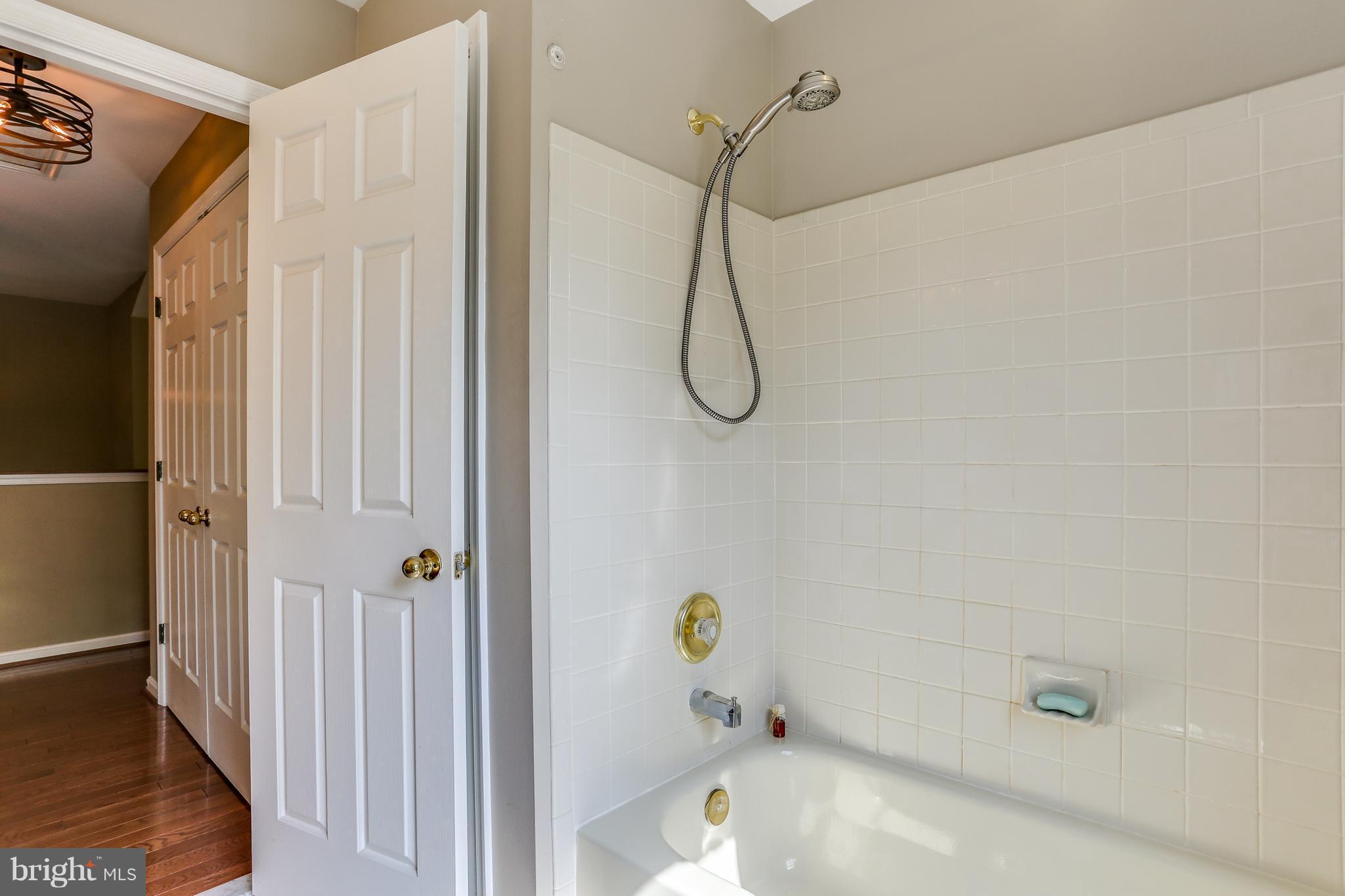 8130 Crest Road Laurel, MD 20723 - Photo 21 of 30 Full Hall Bathroom with Ceramic Tile Shower