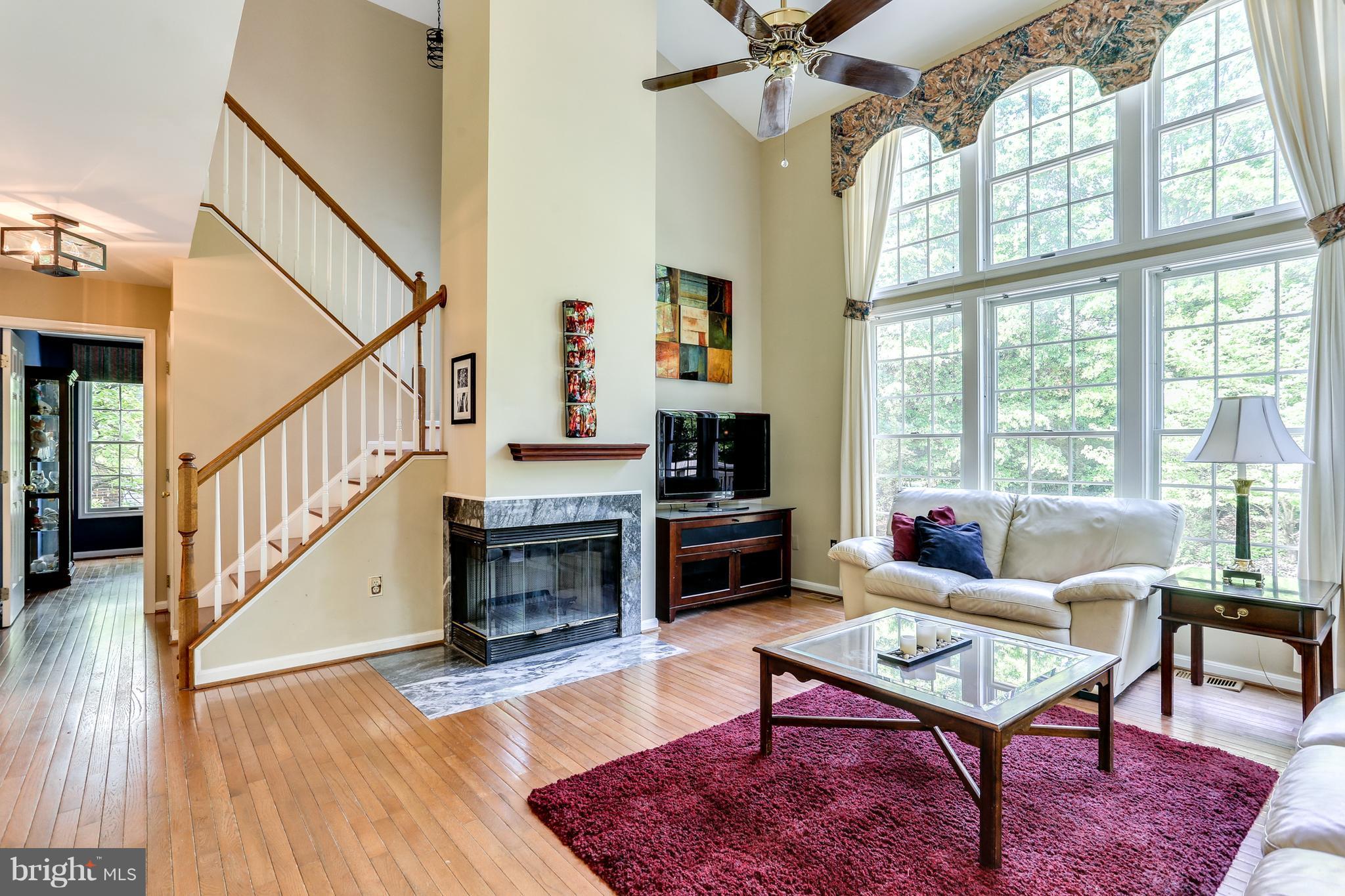 8130 Crest Road Laurel, MD 20723 - Photo 7 of 30 Family Room- Two Sided Wood Burning Fireplace