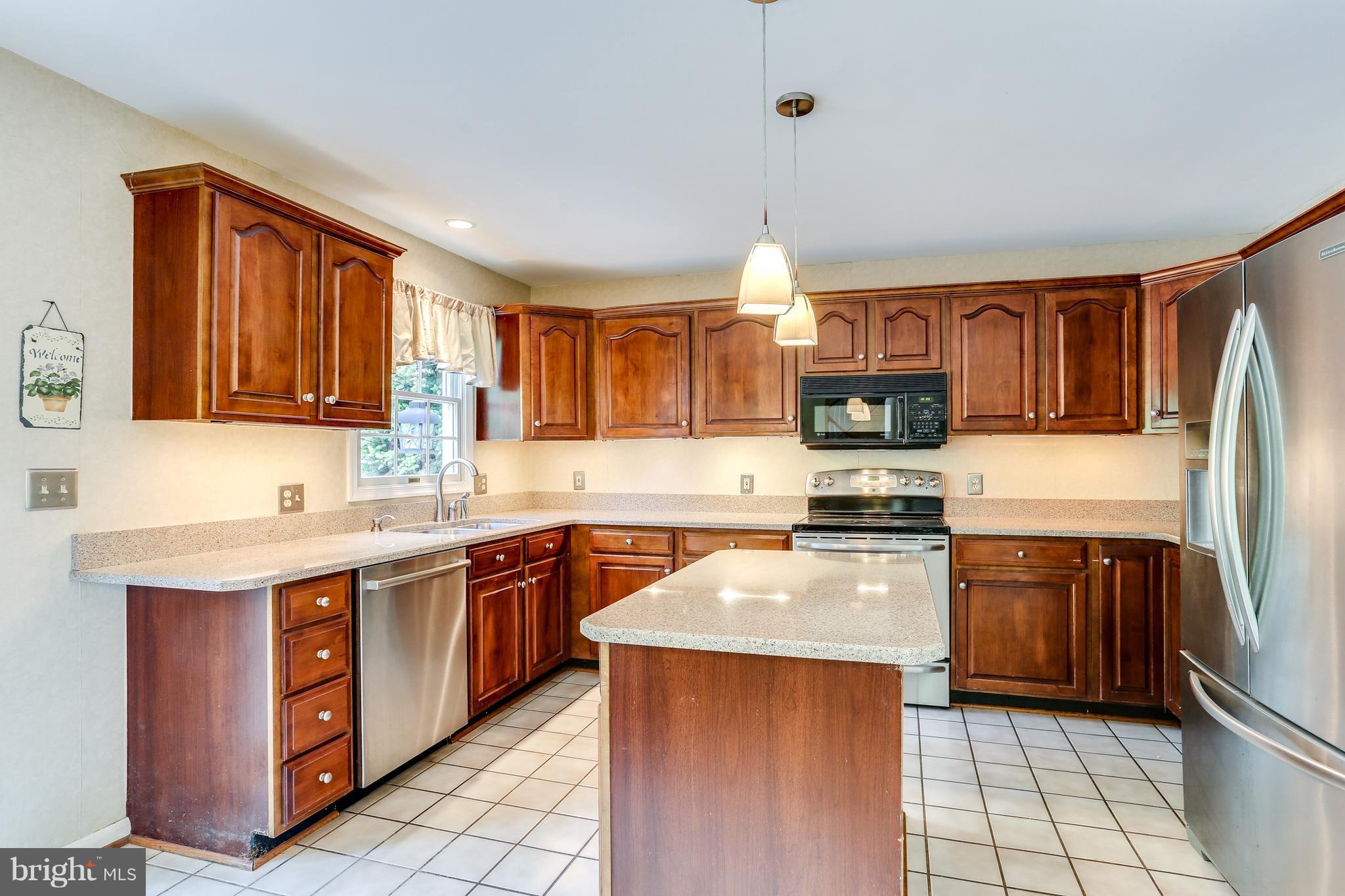 8130 Crest Road Laurel, MD 20723 - Photo 9 of 30 Center Island Great For Prep with Pendant Lighting