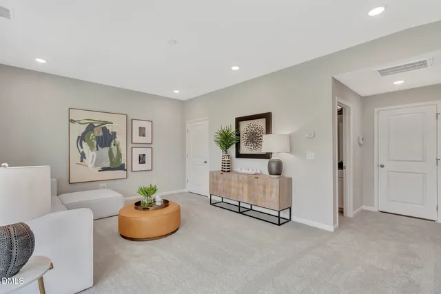 a living room with furniture and a couch