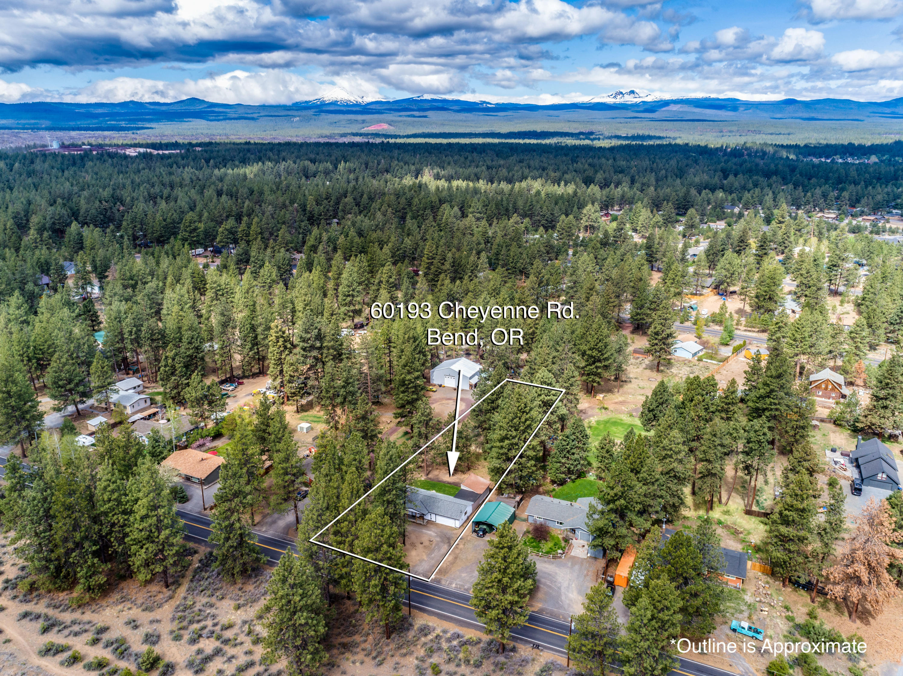 60193 Cheyenne Road Bend, OR 97702 - Photo 2 of 29 a view of a garden with a lake
