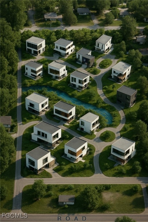 536 Evergreen Road North Fort Myers, FL 33903 - Photo 18 of 19 an aerial view of residential houses with outdoor space