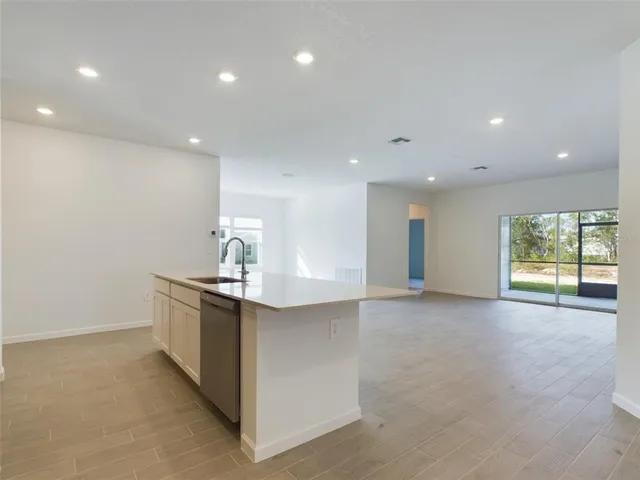 a view of a kitchen and a sink