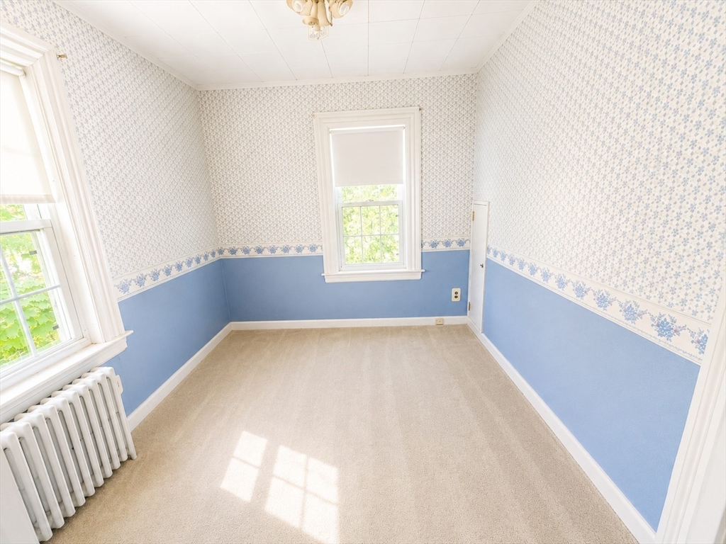 36 Plummer Avenue Lowell, MA 01852 - Photo 16 of 23 a view of an empty room with a window