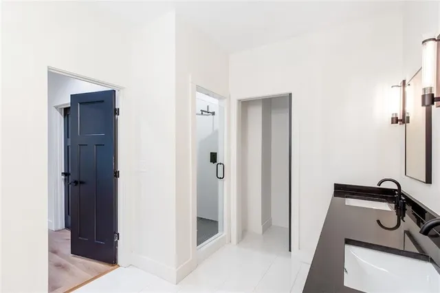 a bathroom with a shower and toilet