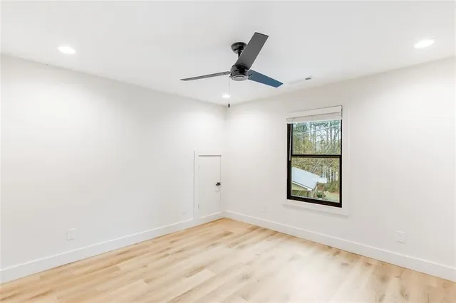 a view of an empty room and window