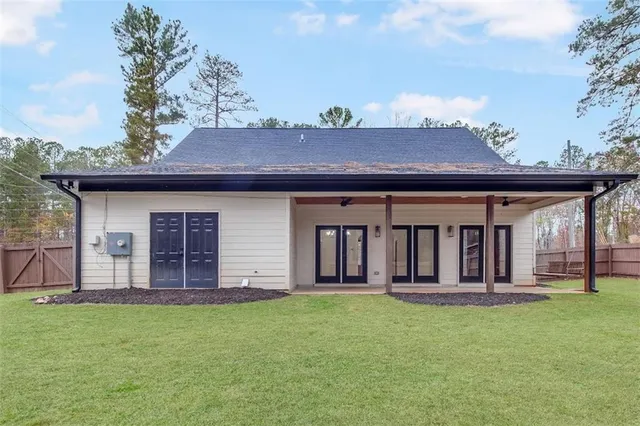 a view of a house with a garden