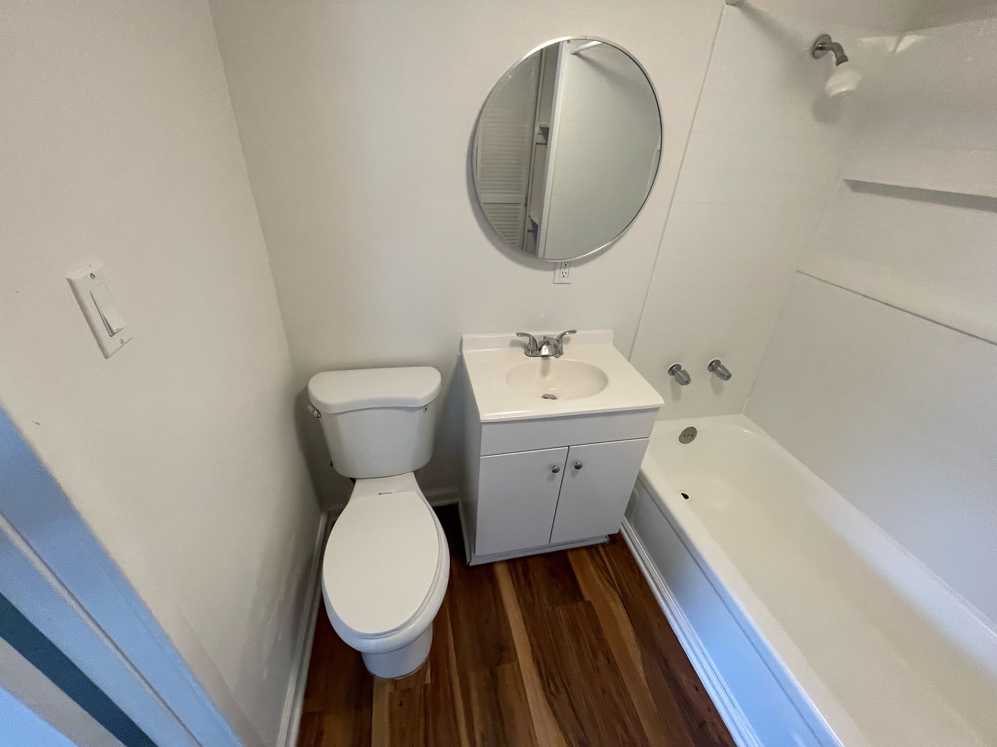 6404 Ponca Street, Unit B Austin, TX 78741 - Photo 13 of 17 a bathroom with a sink and a mirror