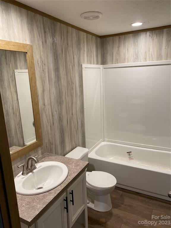 592 Tight Run Loop Rd Union Mills Union Mills, NC 28167 - Photo 14 of 25 a bathroom with a granite countertop sink toilet and shower