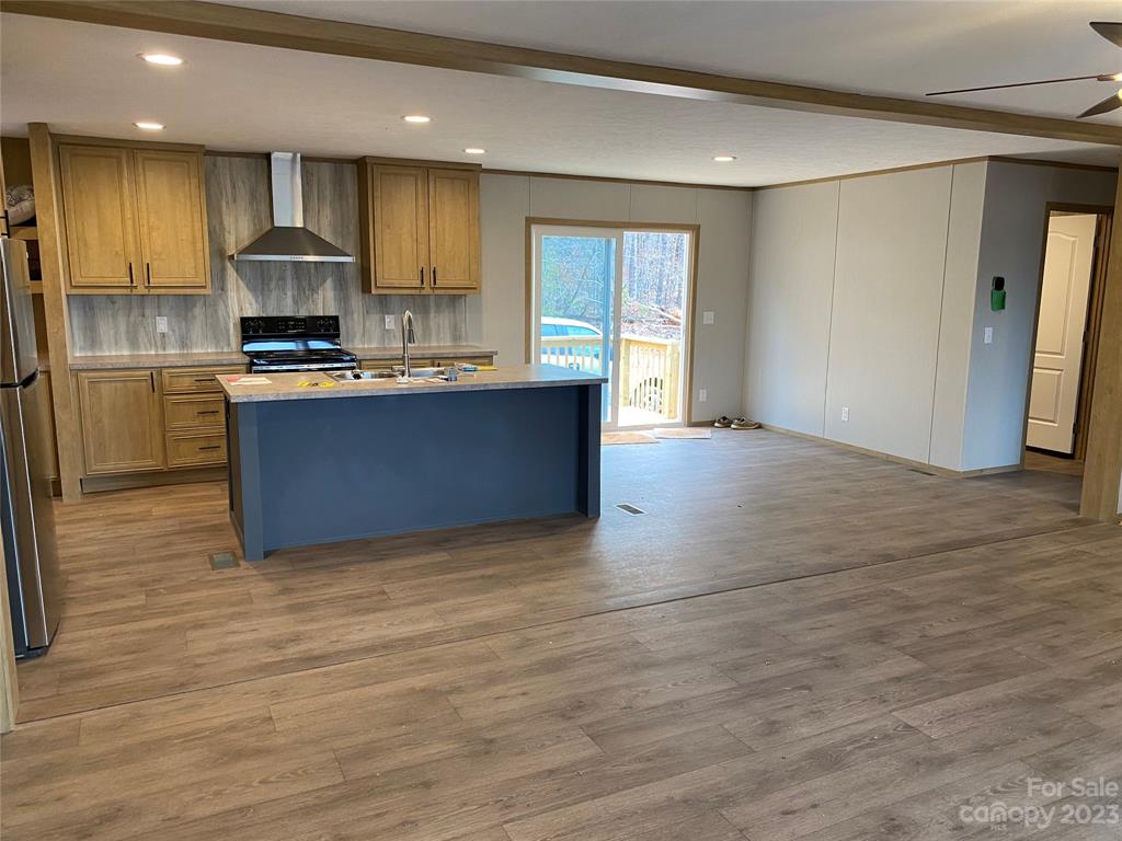 592 Tight Run Loop Rd Union Mills Union Mills, NC 28167 - Photo 7 of 25 a view of kitchen with wooden floor