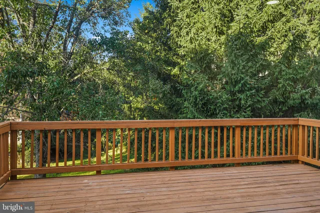 a view of a hallway with stairs