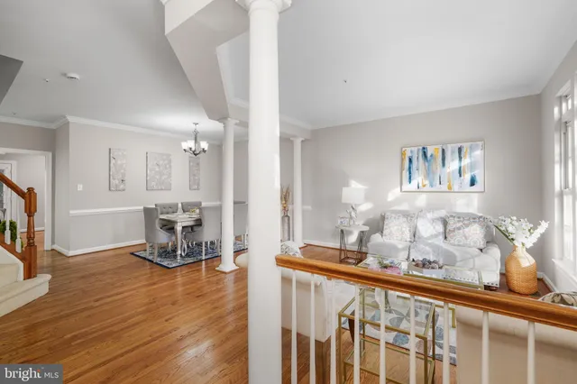 a view of a living room and dining room