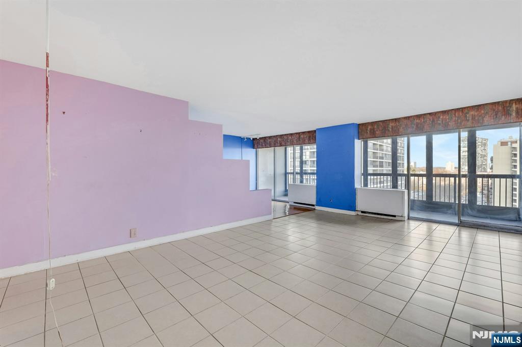 5 Horizon Road, Unit 907 Fort Lee, NJ 07024 - Photo 26 of 50 a view of an empty room with a window