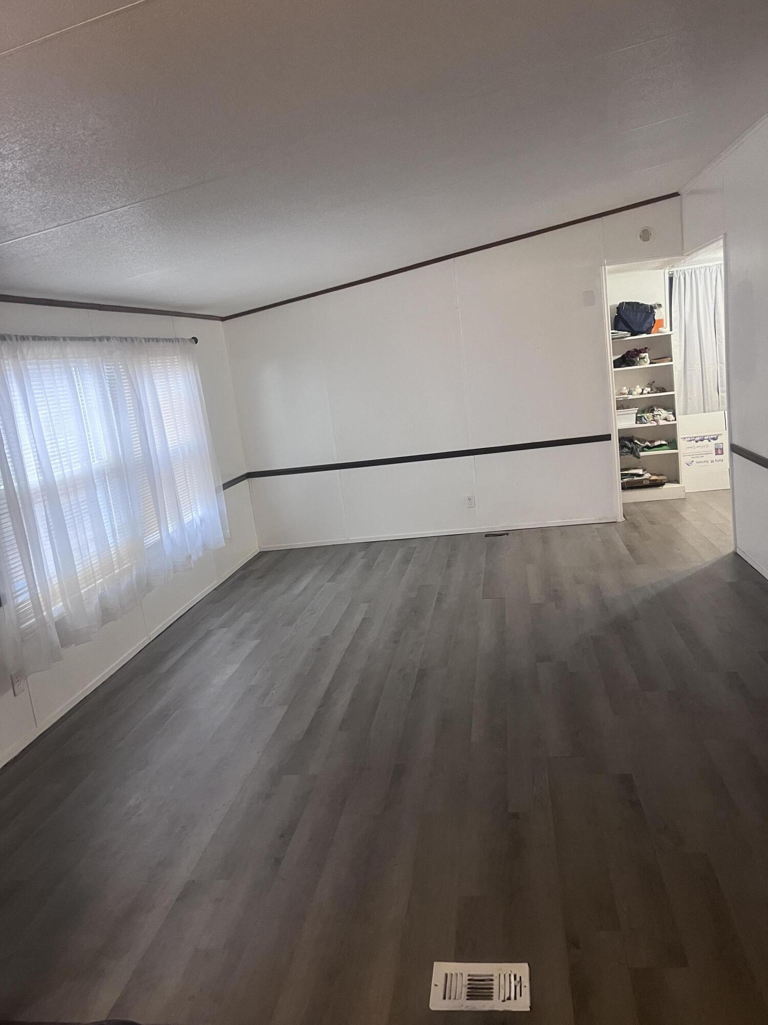 1923 Redwood Road Southeast Roanoke, VA 24014 - Photo 15 of 31 a view of empty room with wooden floor