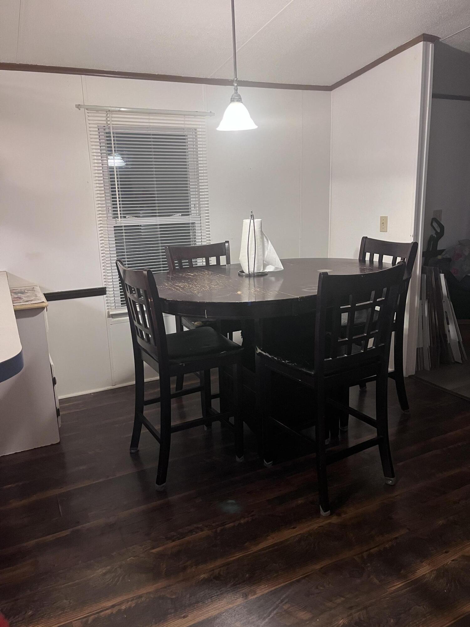 1923 Redwood Road Southeast Roanoke, VA 24014 - Photo 18 of 31 a view of a dining room with furniture and wooden floor