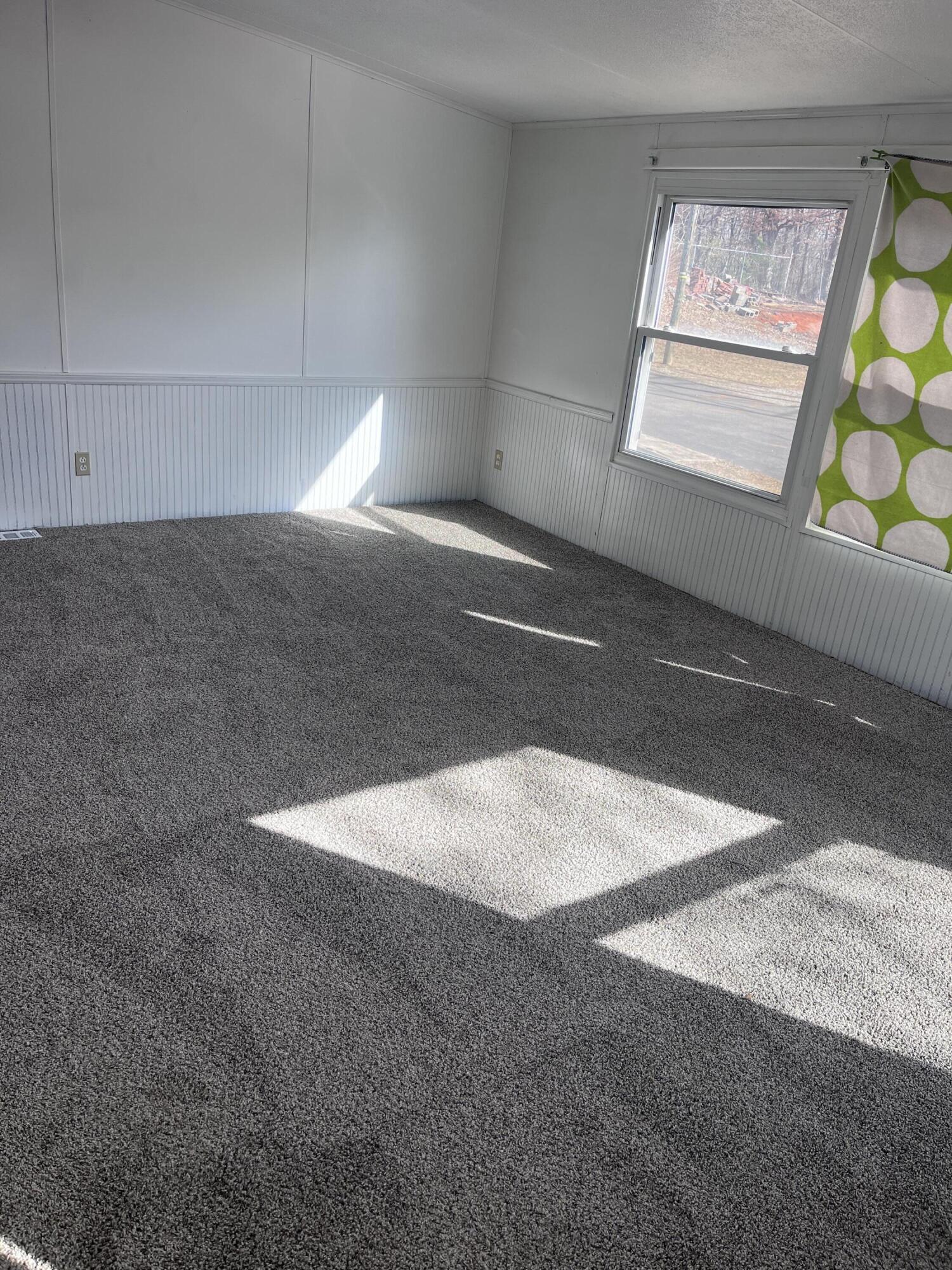 1923 Redwood Road Southeast Roanoke, VA 24014 - Photo 20 of 31 a view of an empty room with a window