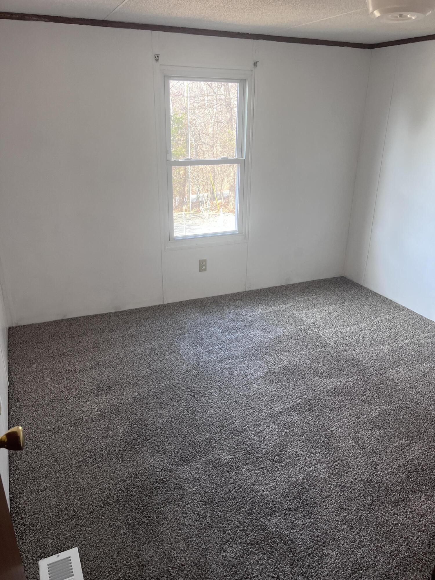 1923 Redwood Road Southeast Roanoke, VA 24014 - Photo 21 of 31 an empty room with a window