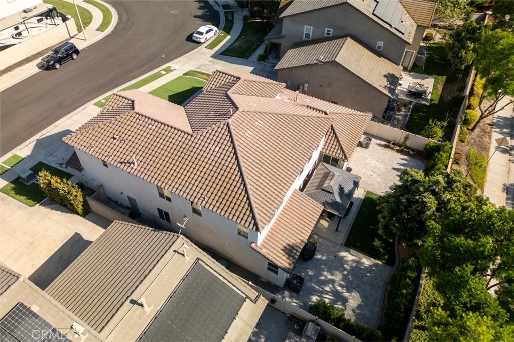 14977 Brooktree Street Eastvale, CA 92880 - Photo 23 of 34 an aerial view of a house with a yard