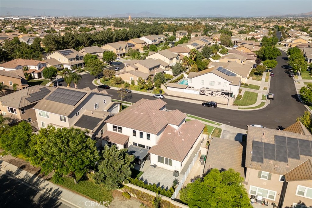 14977 Brooktree Street Eastvale, CA 92880 - Photo 24 of 34 an aerial view of residential house with outdoor space