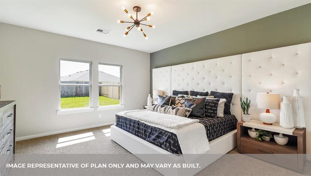 535 Hunter Grove Lane China, TX 77613 - Photo 5 of 10 a bedroom with a bed and a window