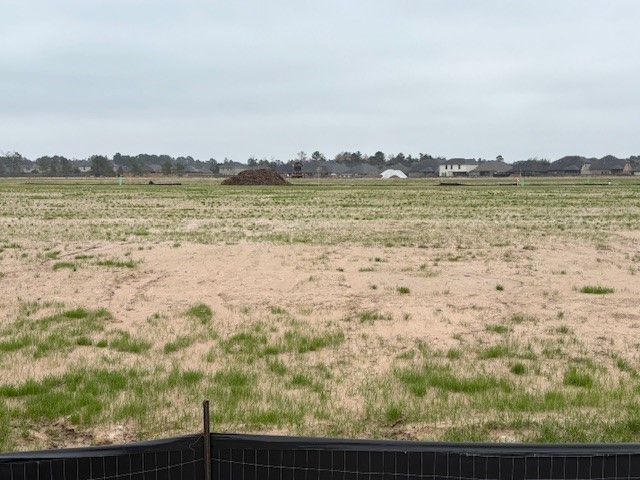 535 Hunter Grove Lane China, TX 77613 - Photo 10 of 10 a view of a lake with houses in the back