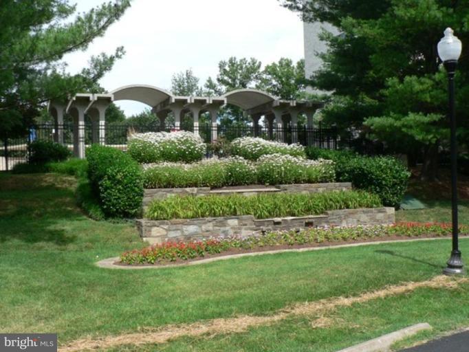 1111 University Boulevard West, Unit 413A Silver Spring, MD 20902 - Photo 14 of 14 a view of a garden