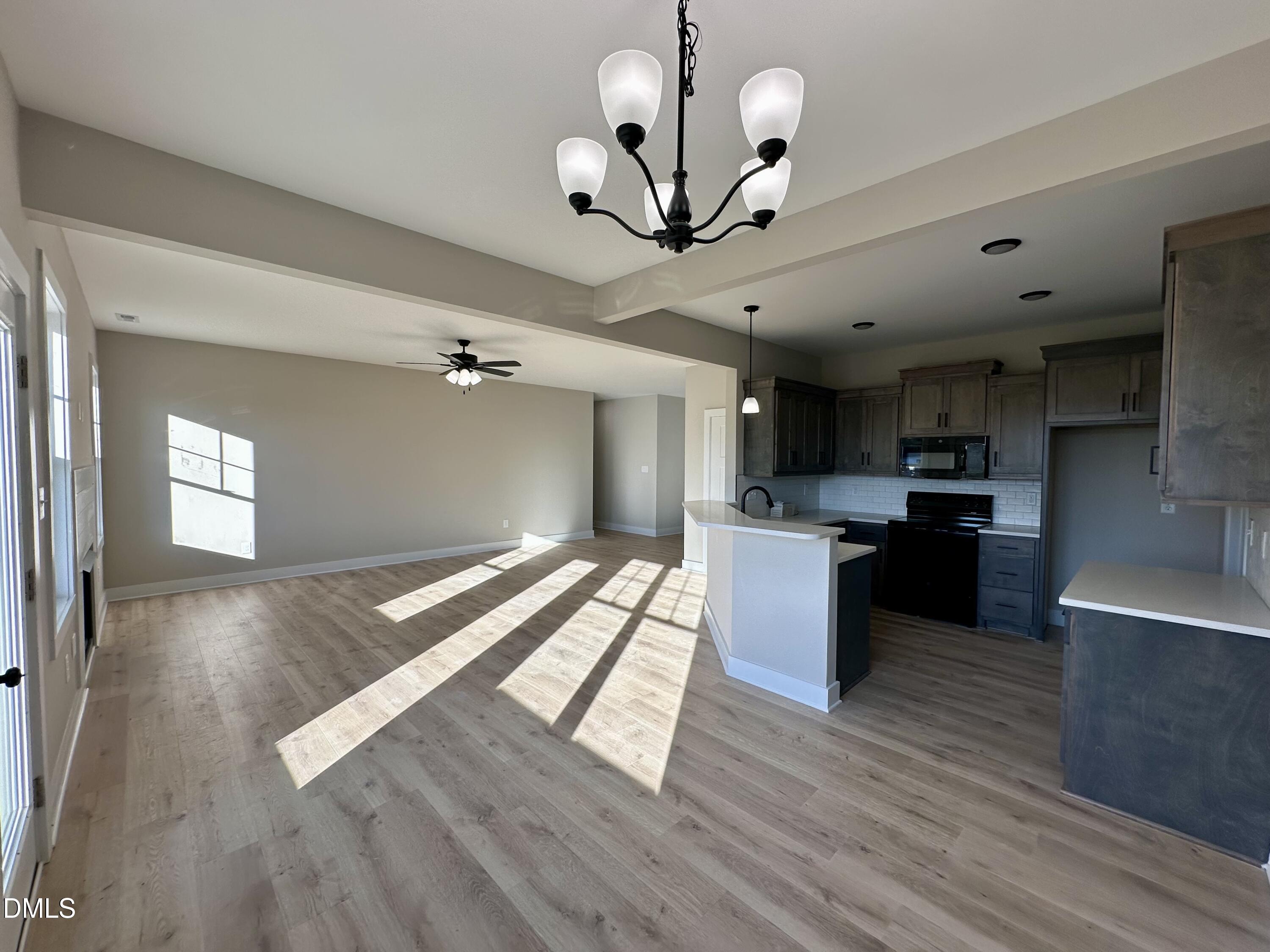 165 Bay Valley Road Kenly, NC 27542 - Photo 5 of 22 a view of kitchen with sink microwave and stove