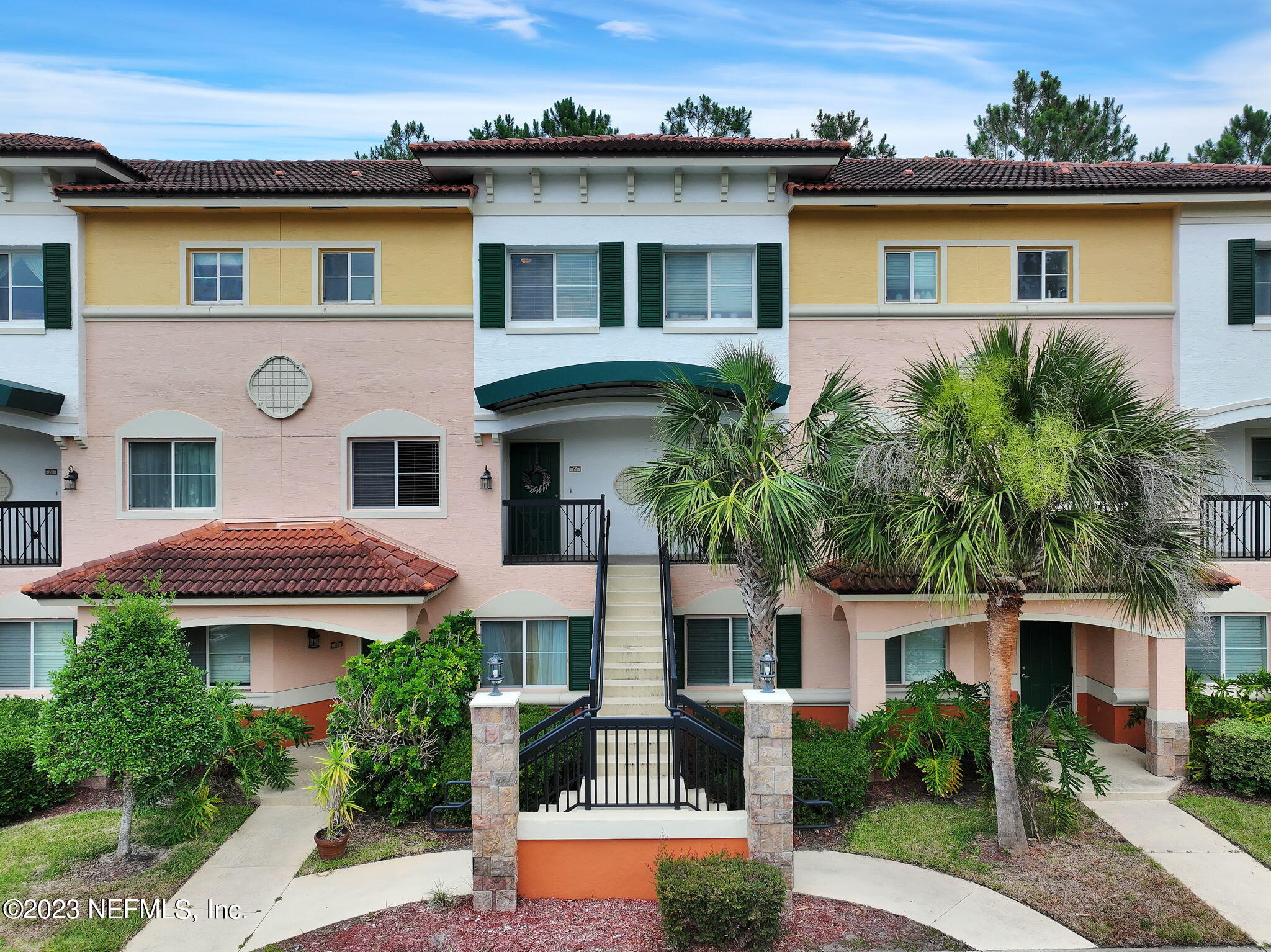 9745 Touchton Road, Unit 428 Jacksonville, FL 32246 - Photo 1 of 40 a front view of a house with a yard