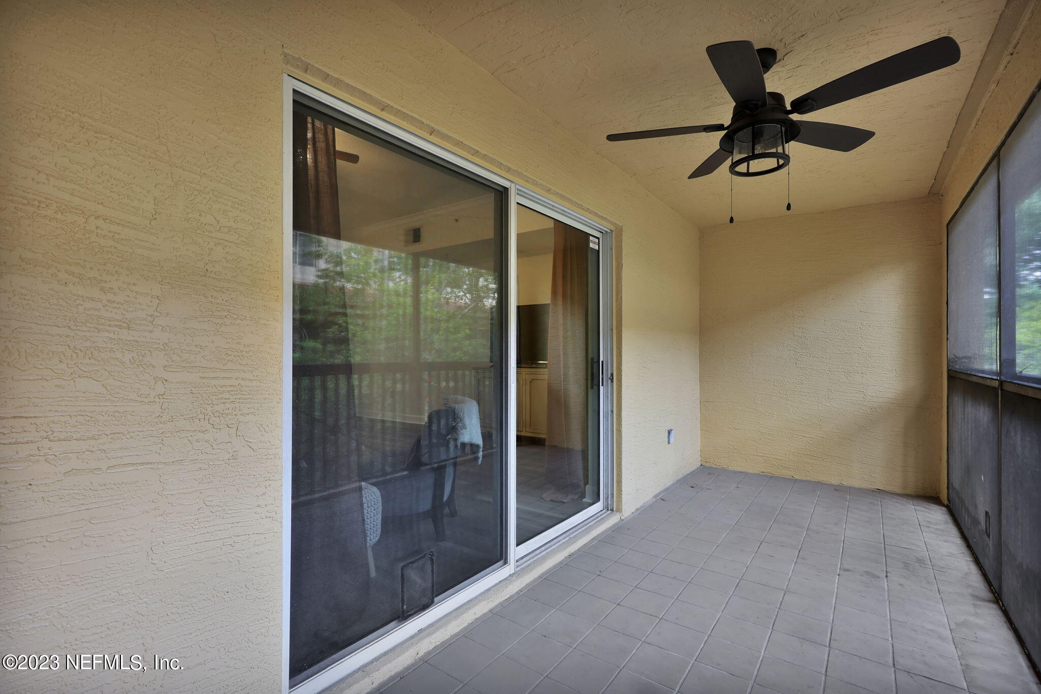 9745 Touchton Road, Unit 428 Jacksonville, FL 32246 - Photo 20 of 40 a view of a hallway with a glass door