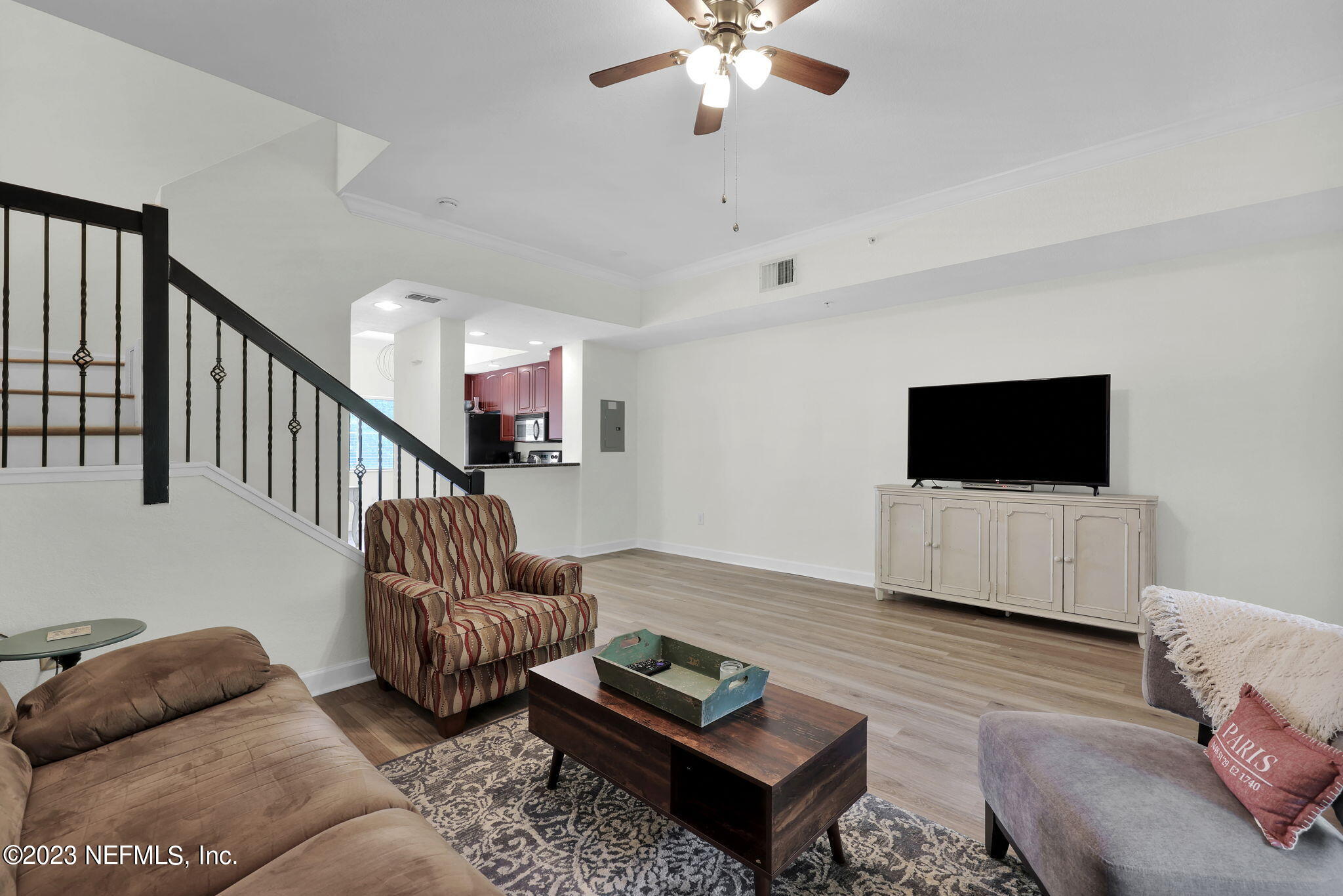 9745 Touchton Road, Unit 428 Jacksonville, FL 32246 - Photo 22 of 40 a living room with furniture and a flat screen tv