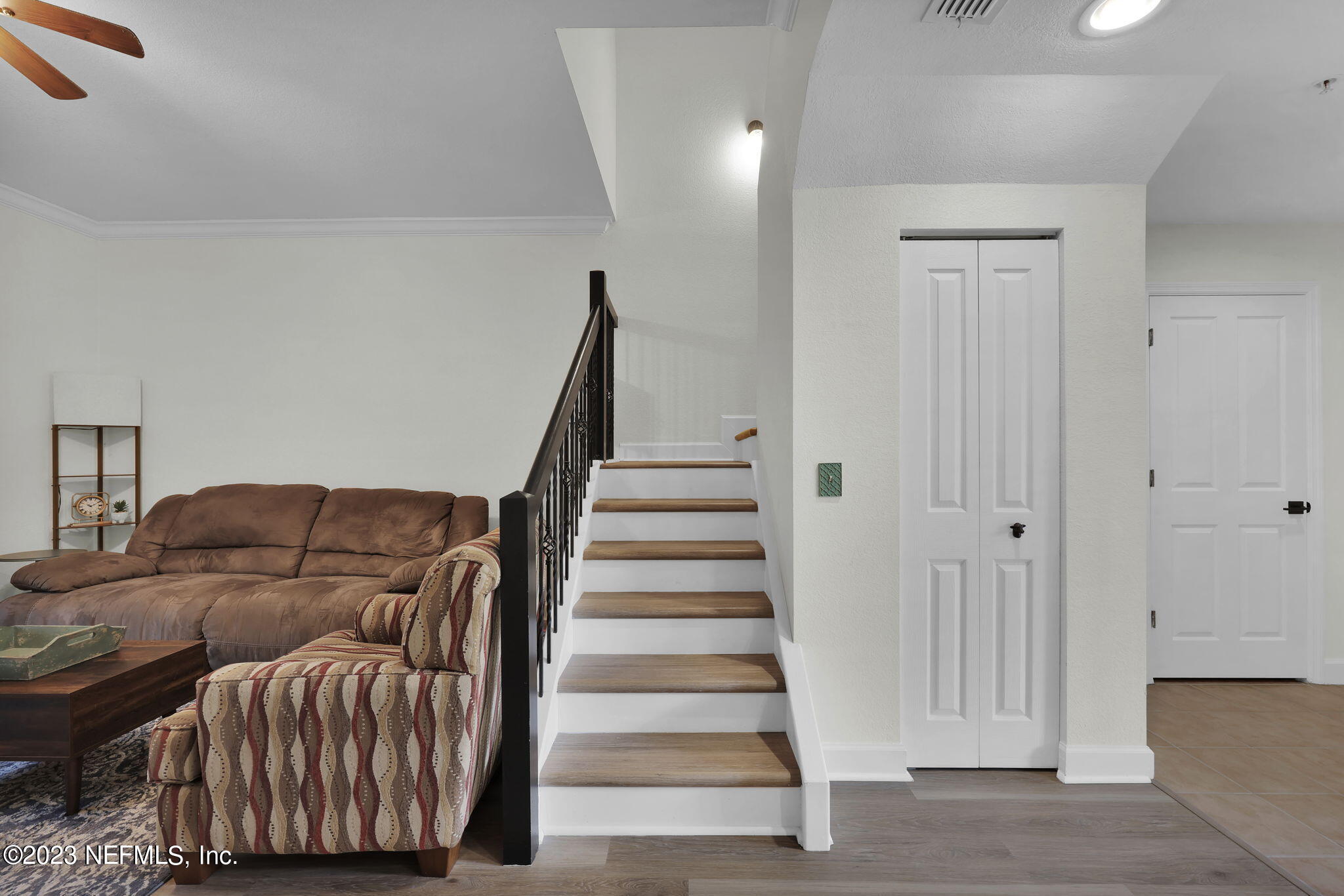 9745 Touchton Road, Unit 428 Jacksonville, FL 32246 - Photo 24 of 40 a view of entryway and hall with wooden floor