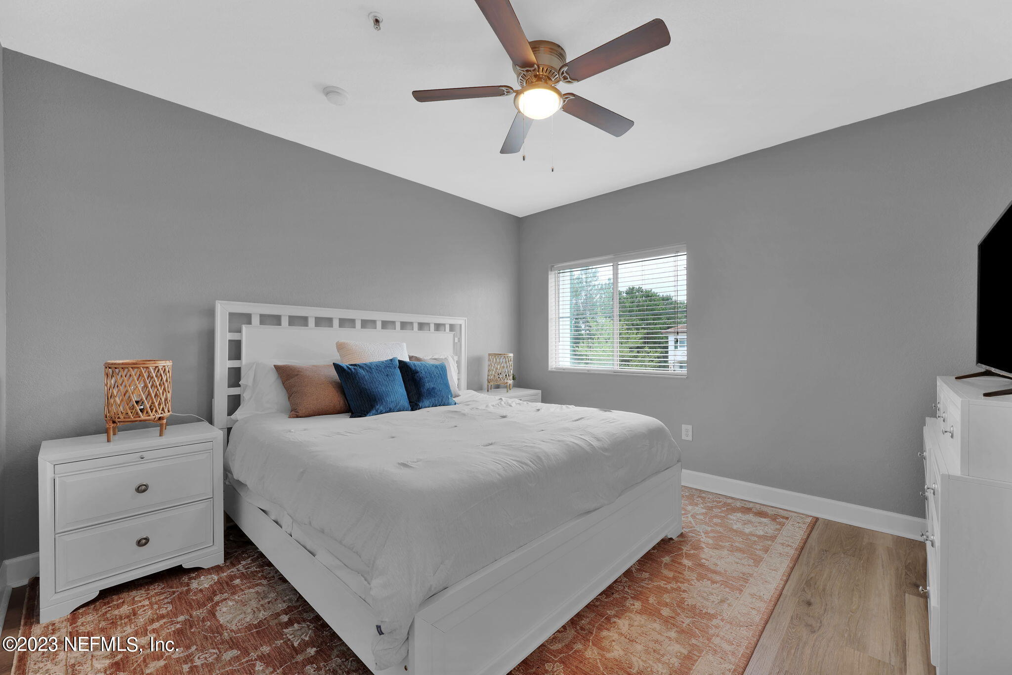 9745 Touchton Road, Unit 428 Jacksonville, FL 32246 - Photo 25 of 40 a bedroom with a bed and a window