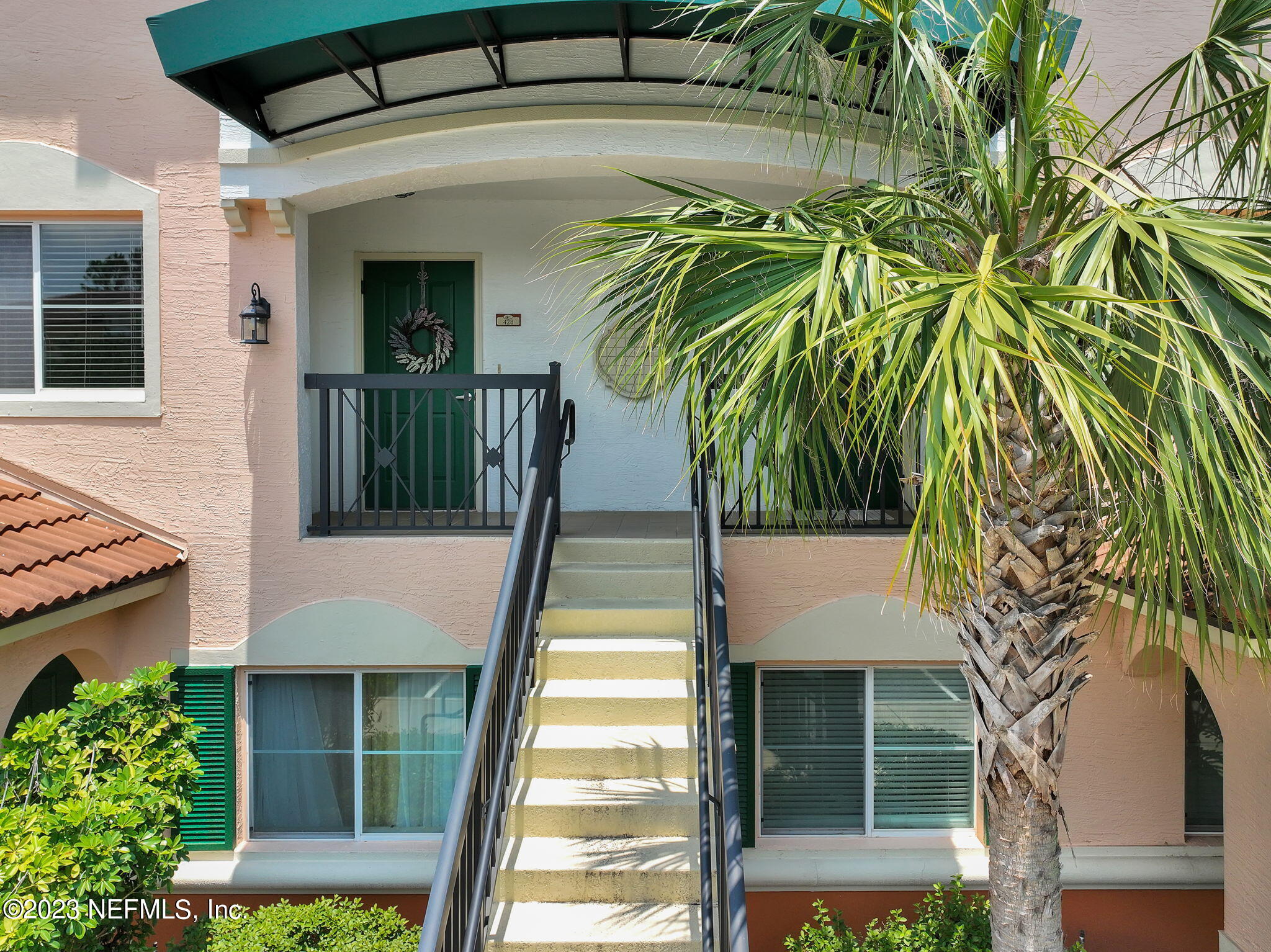 9745 Touchton Road, Unit 428 Jacksonville, FL 32246 - Photo 31 of 40 a view of front door and small plants