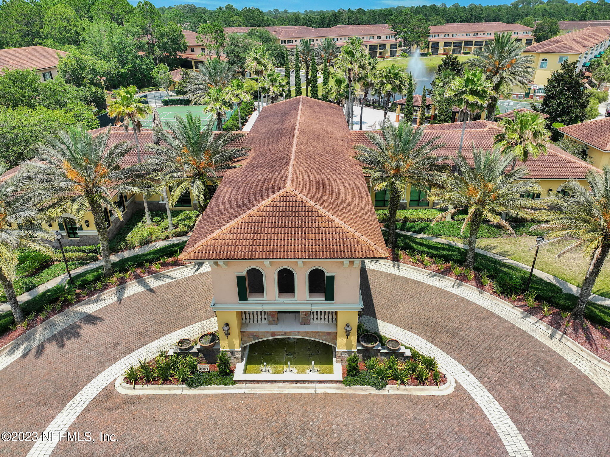 9745 Touchton Road, Unit 428 Jacksonville, FL 32246 - Photo 36 of 40 an aerial view of a house with a yard and sitting area