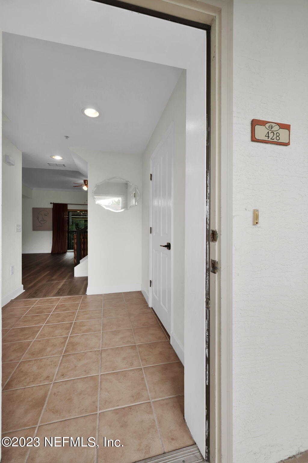 9745 Touchton Road, Unit 428 Jacksonville, FL 32246 - Photo 8 of 40 a view of a hallway with a hallway