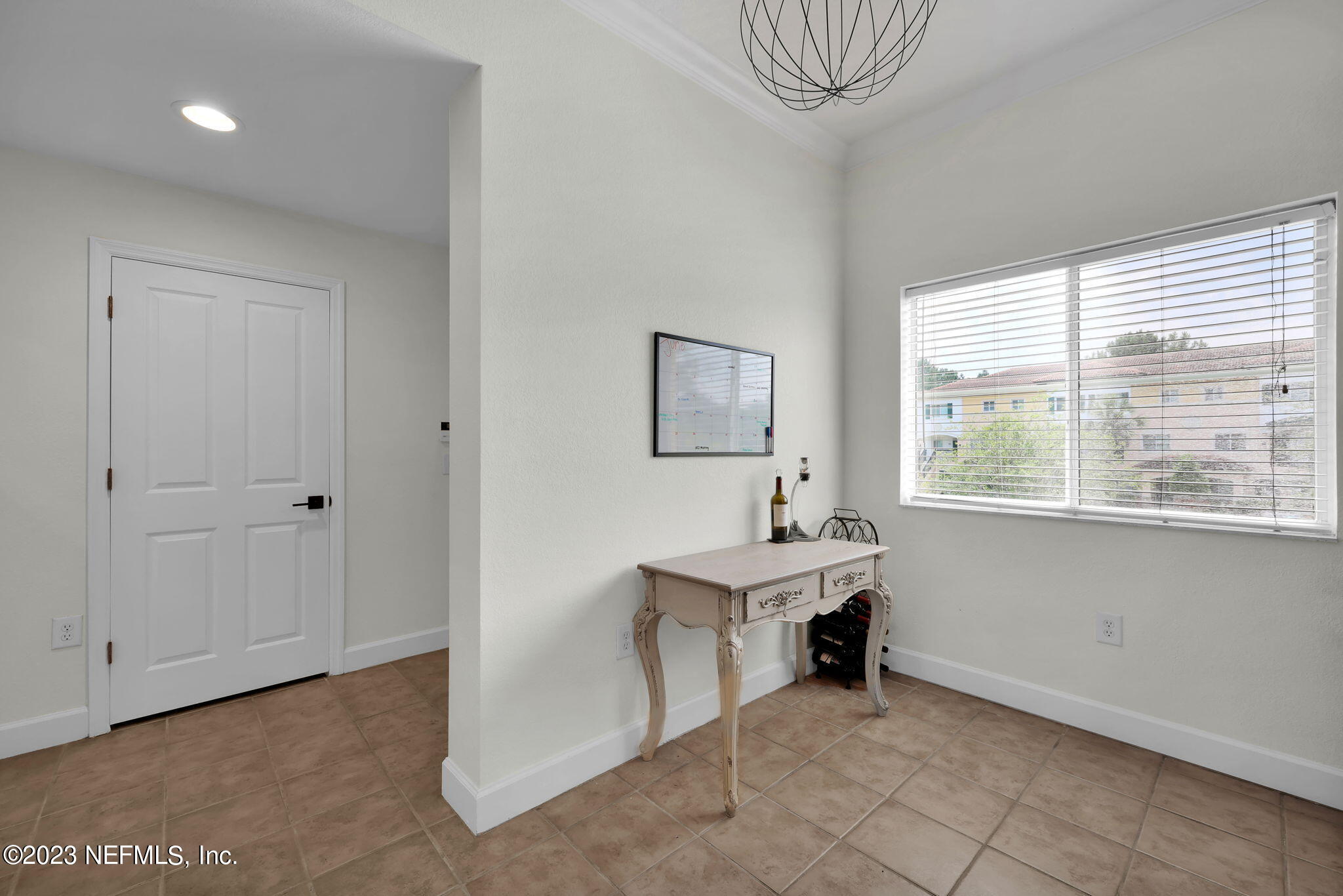 9745 Touchton Road, Unit 428 Jacksonville, FL 32246 - Photo 10 of 40 a view of a room with a window and cabinet