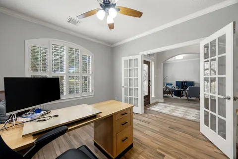 a room with furniture and flat screen tv