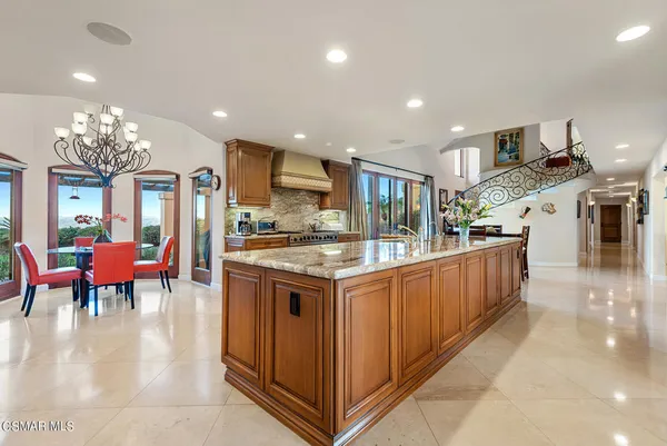 a living room with furniture fireplace and flat screen tv