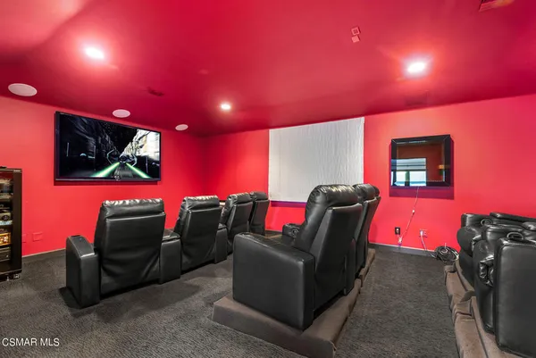 a very nice looking living room with furniture and floor to ceiling window