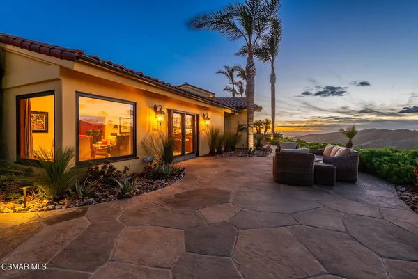 a garden view with a sitting space