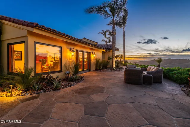 a garden view with a sitting space