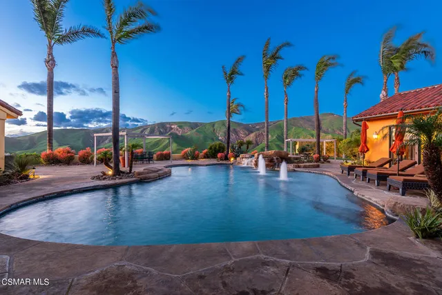 a view of a balcony with an ocean view