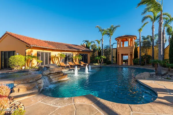 a view of a living room and kitchen floor