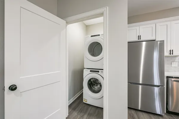a kitchen with a stove and a microwave