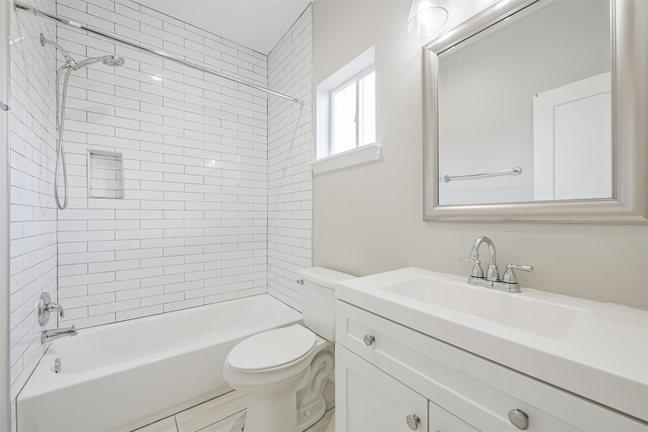 4405 Mallow Street Houston, TX 77051 - Photo 16 of 21 a bathroom with a sink a toilet and shower