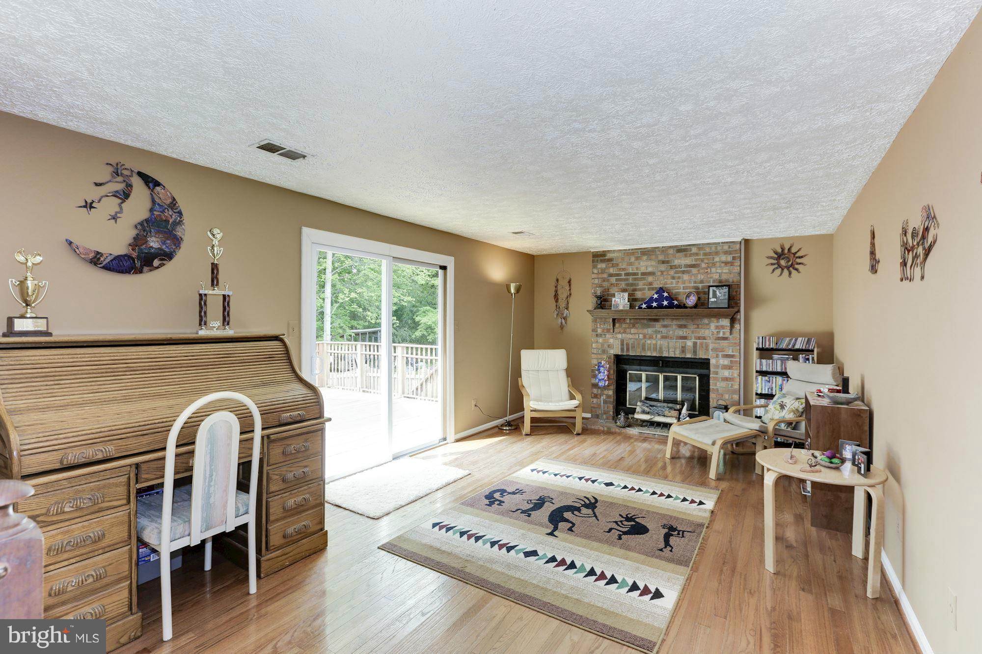 8524 Innisfree Drive Springfield, VA 22153 - Photo 11 of 30 Family Room with fireplace