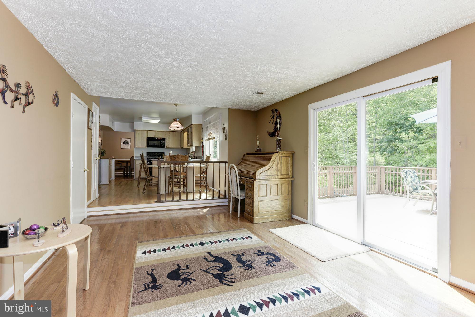 8524 Innisfree Drive Springfield, VA 22153 - Photo 12 of 30 Family Room opens to fabulous deck